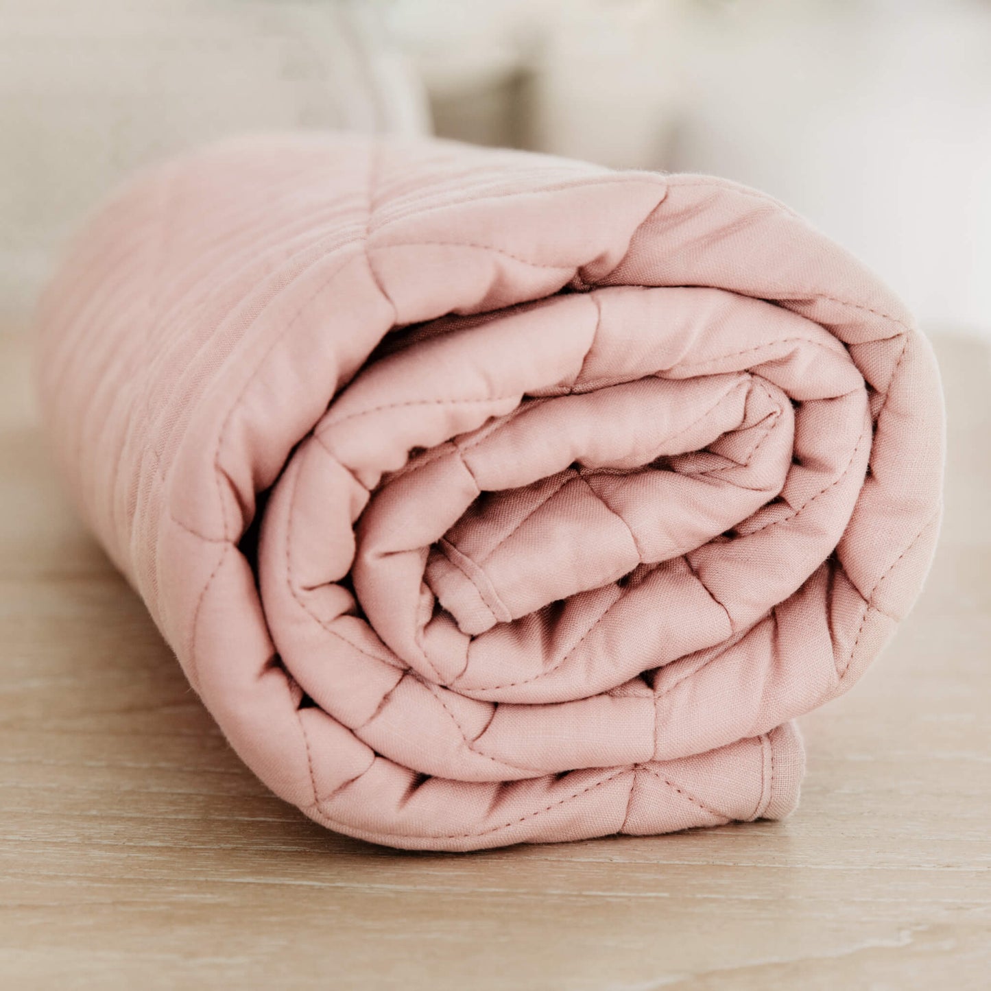 Pink quilted linen playmat